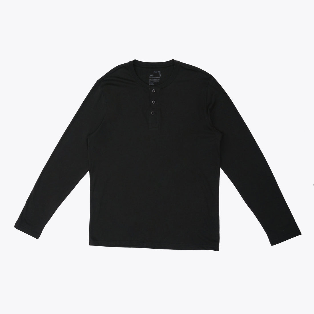 Polo negro Henley manga larga de algodón Pima cuello panadero, vista frontal con modelo